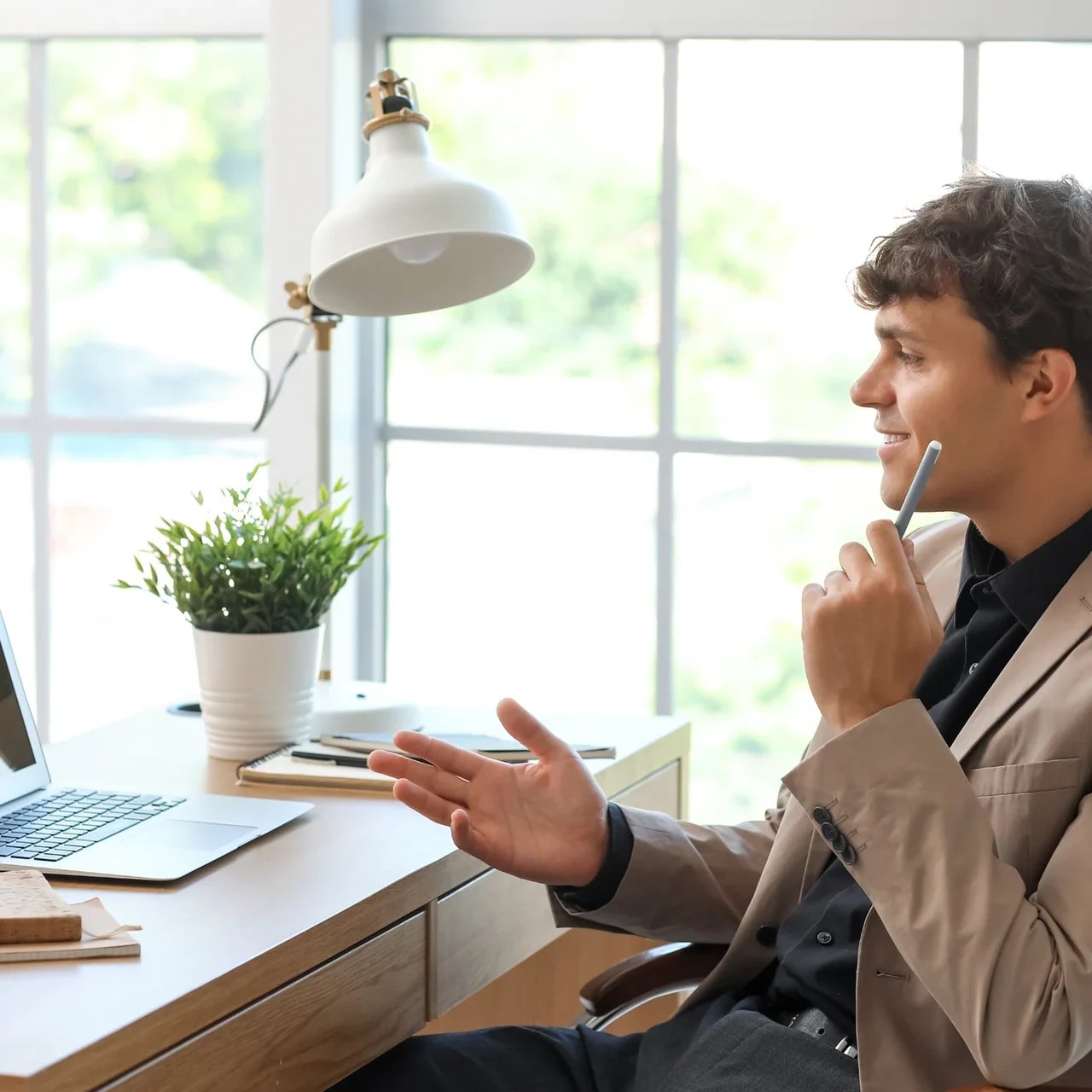 Professional talking during an online call.