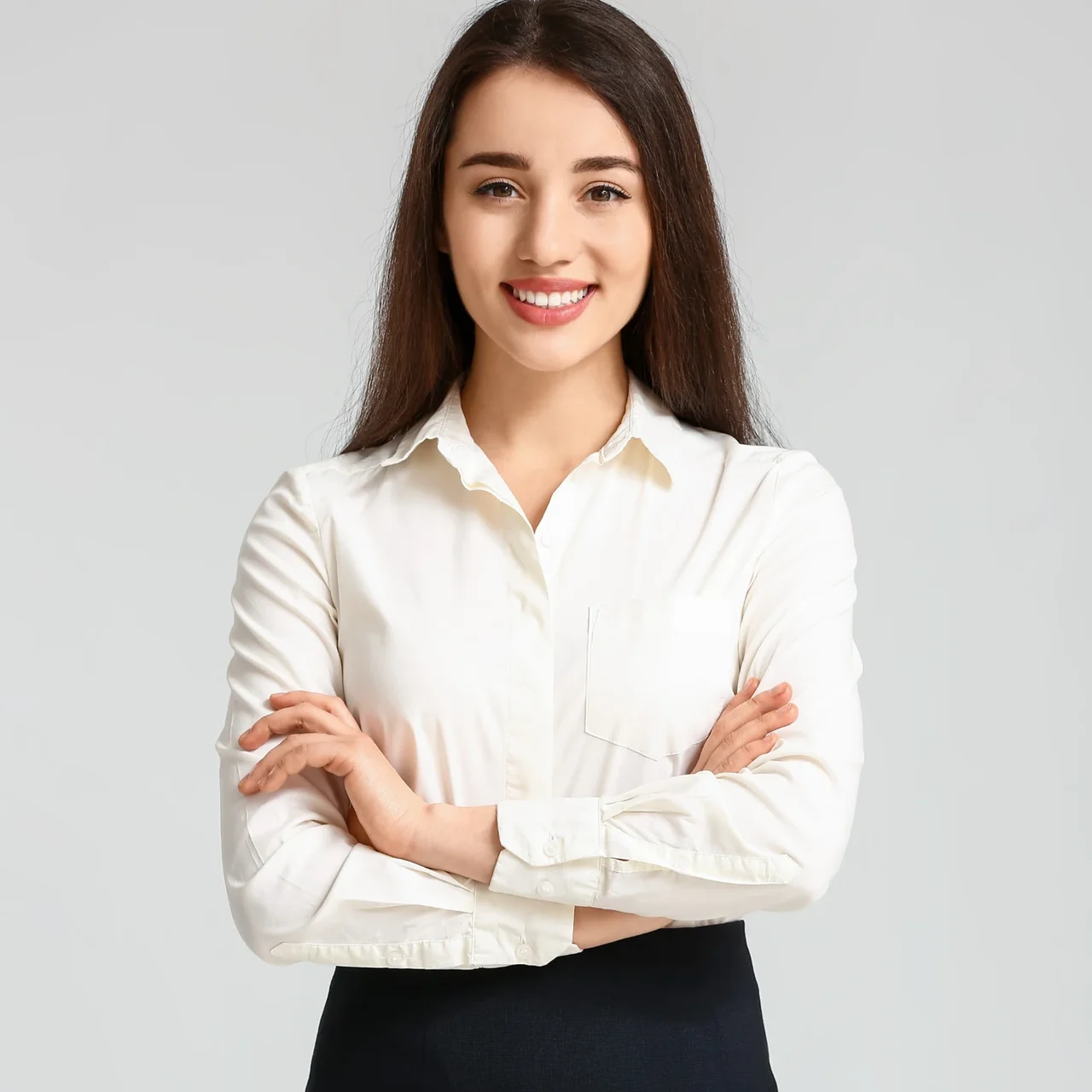 Professional in a white shirt against a neutral background.